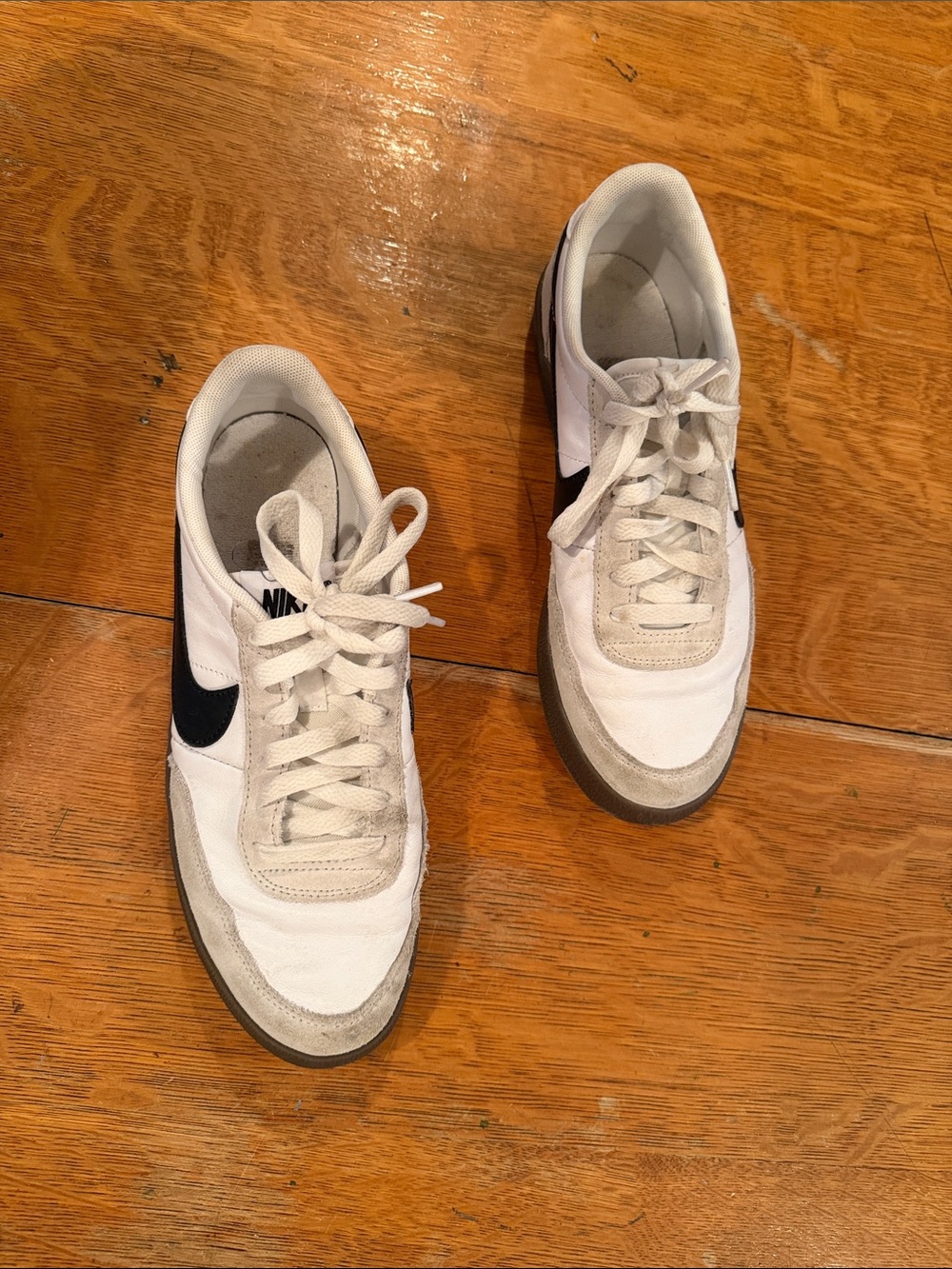 Nike White Sneakers with Black Swoosh
